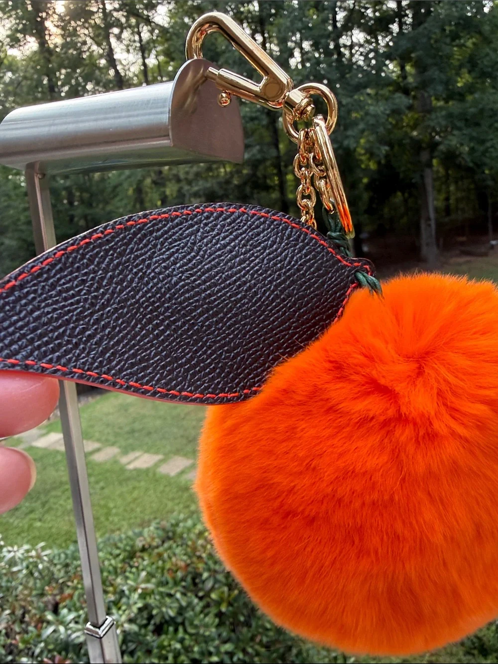 Dolce & Gabbana Orange  Mink Fur Pom-Pom Keychain with Black Leaf Accent